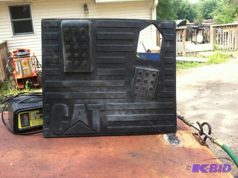 lot 74 image: Caterpillar Skid Steer Floor Mat, Like New