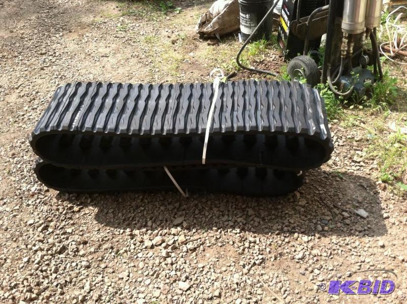 lot 76 image: Brand New Rubber Skid Steer Tracks