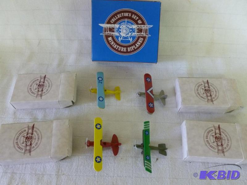 lot 136 image: Collectors set of four die cast airplanes, n...