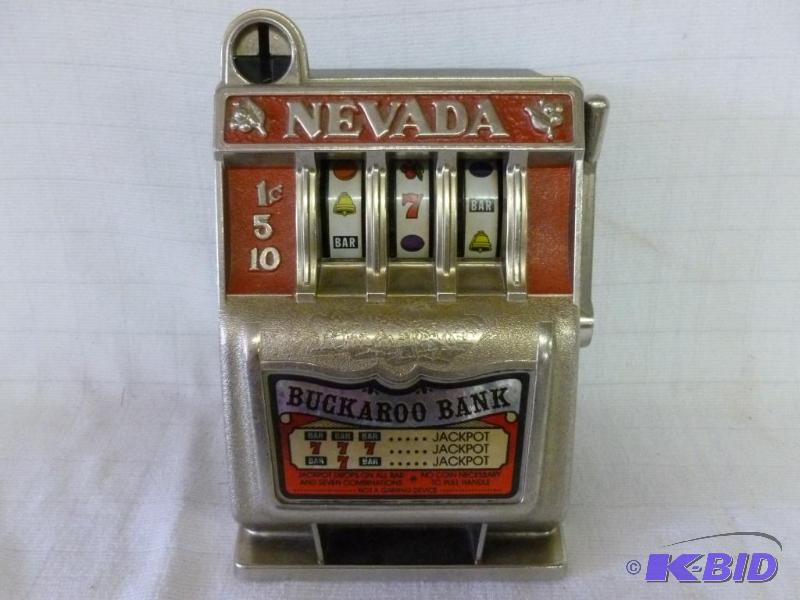lot 144 image: Collectible Nevada Buckaroo Slot Machine Coin...
