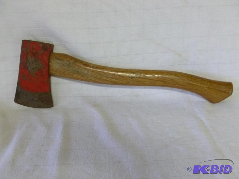 lot 152 image: Large wood handled hatchet that measures 17.5...
