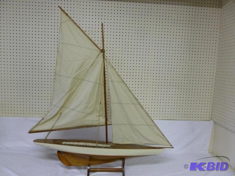lot 17 image: Large wooden sailboat mantle display with sta...
