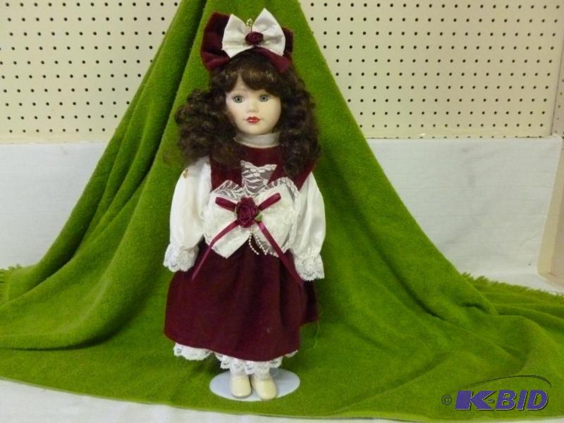 lot 25 image: Beautiful large porcelain doll with stand tha...