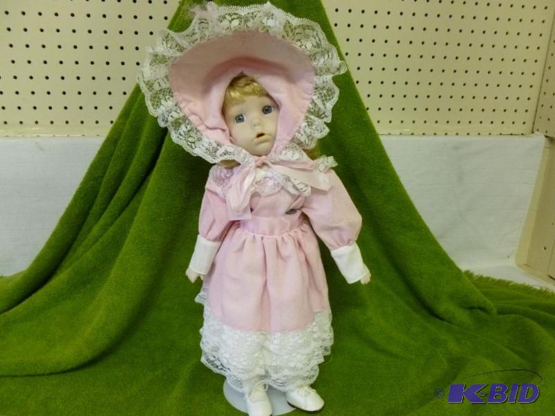 lot 27 image: Beautiful large porcelain doll with stand tha...