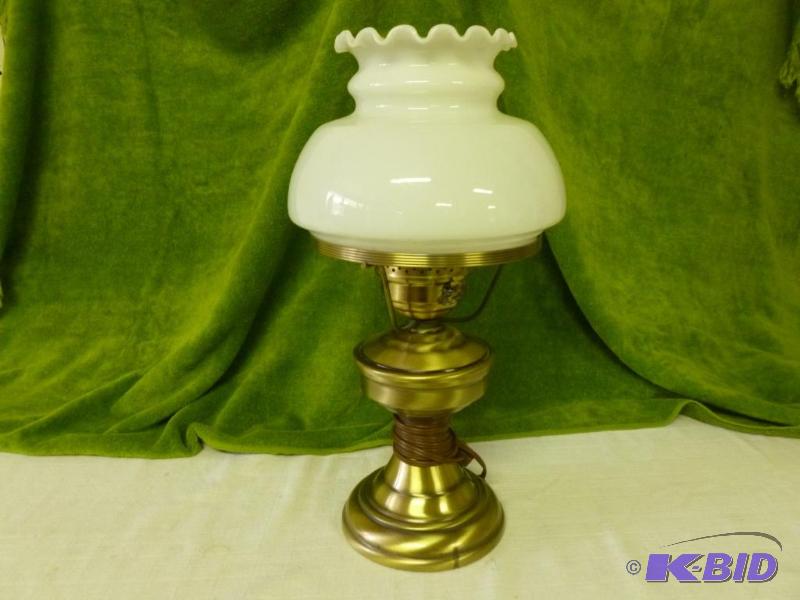 lot 31 image: Brass plated metal with ribbon edge milk glas...