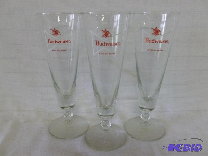 lot 62 image: Lot of three Budweiser long stem beer glasses...
