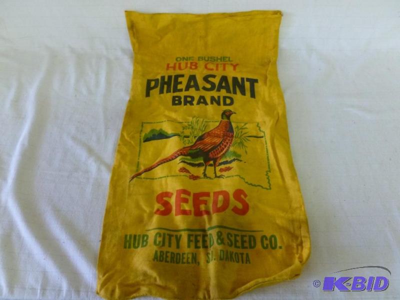 lot 64 image: Vintage Hub City Feed & Seed Co. Aberdeen...
