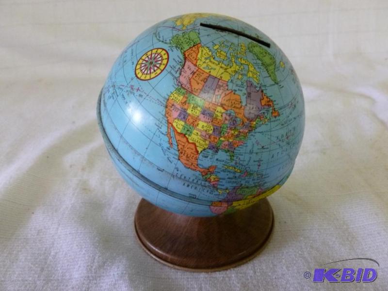 lot 79 image: Vintage Ohio Art all metal globe coin bank, n...