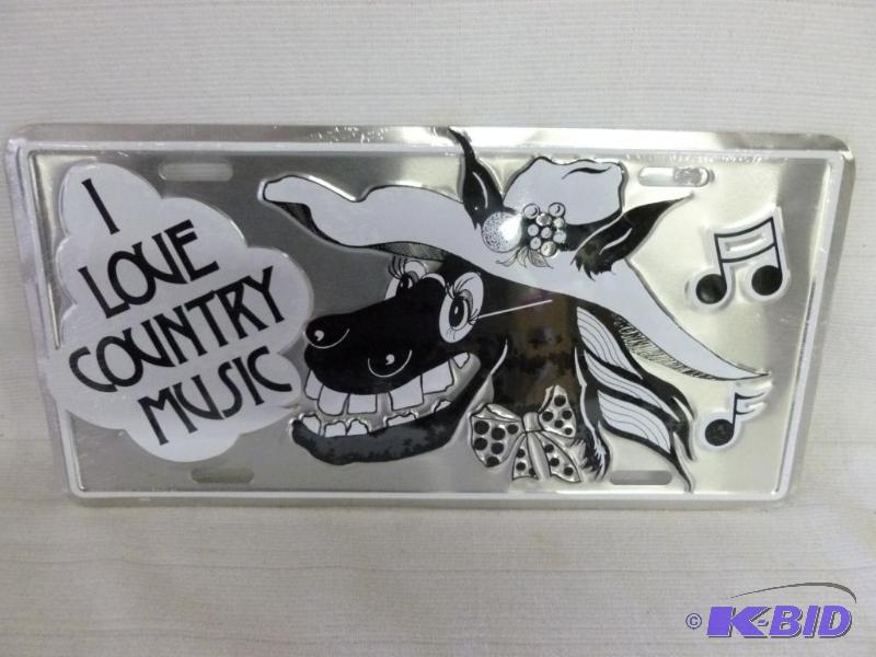 lot 92 image: I Love Country Music embossed metal license&n...