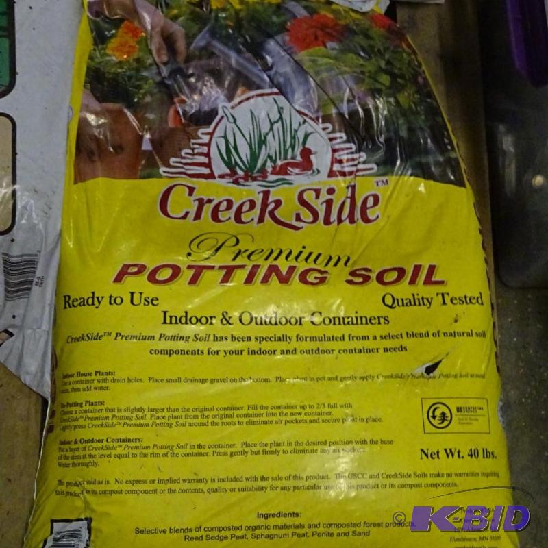 lot 236 image: 2 bags potting soil...
