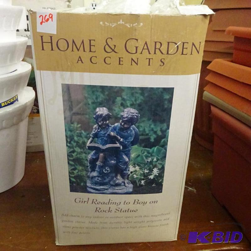 lot 269 image: New in box Home and Garden Accents rock statu...