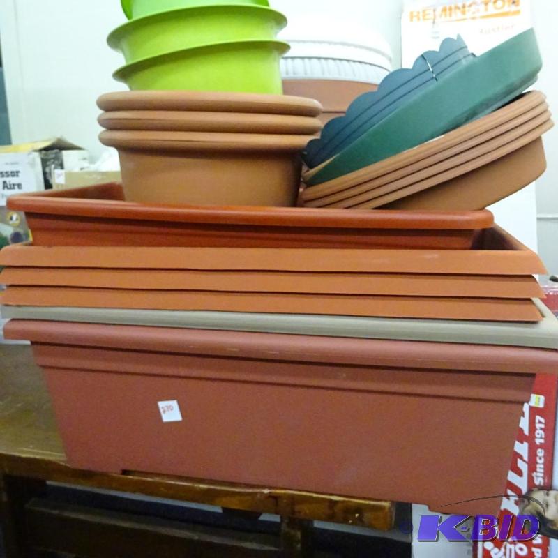 lot 270 image: New Large Lot plastic planters and drip trays...