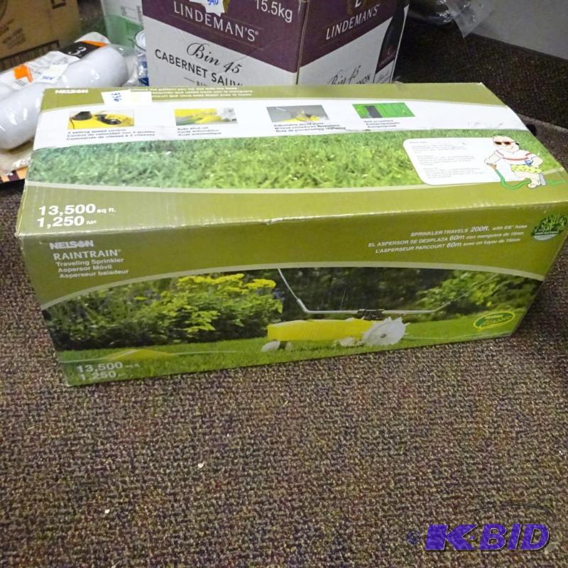 lot 234 image: Nelson RainTrain traveling lawn sprinkler, co...