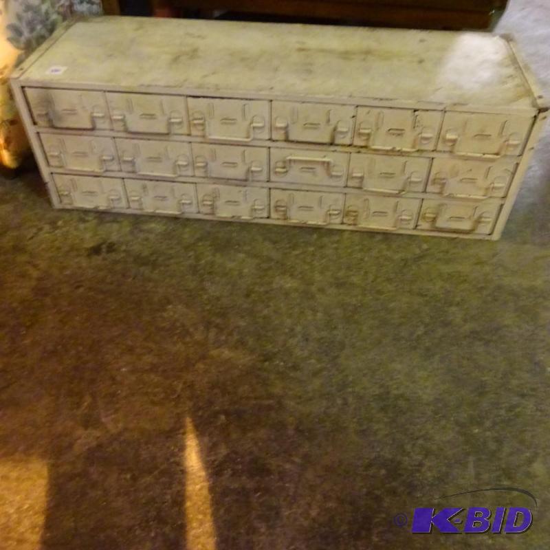 Hardware cabinet . 18 drawers with lots of co...
