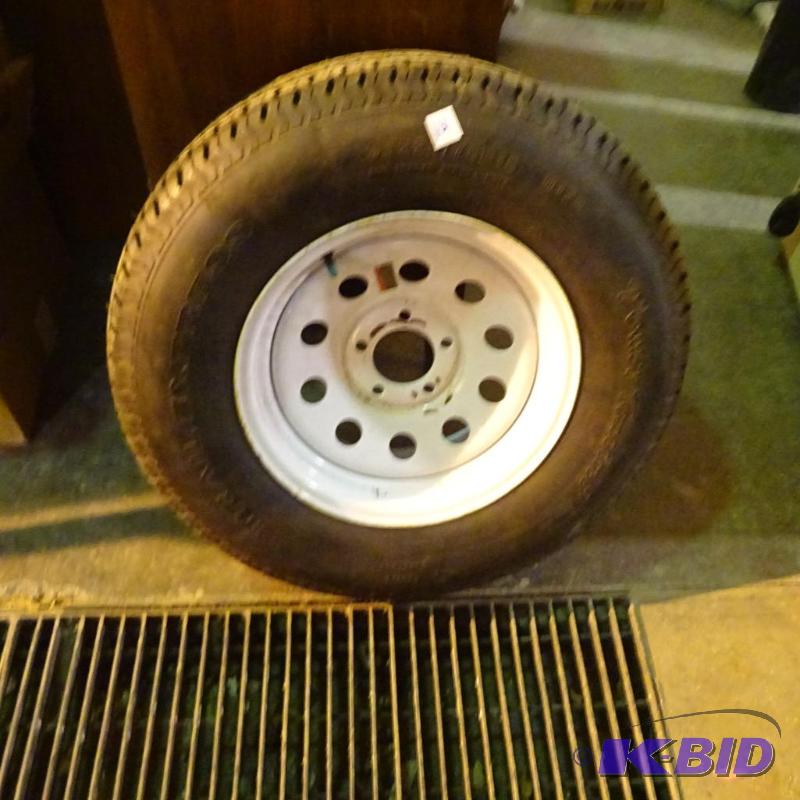 5 hole rim and trailer tire. ST 225-75R15. Br...
