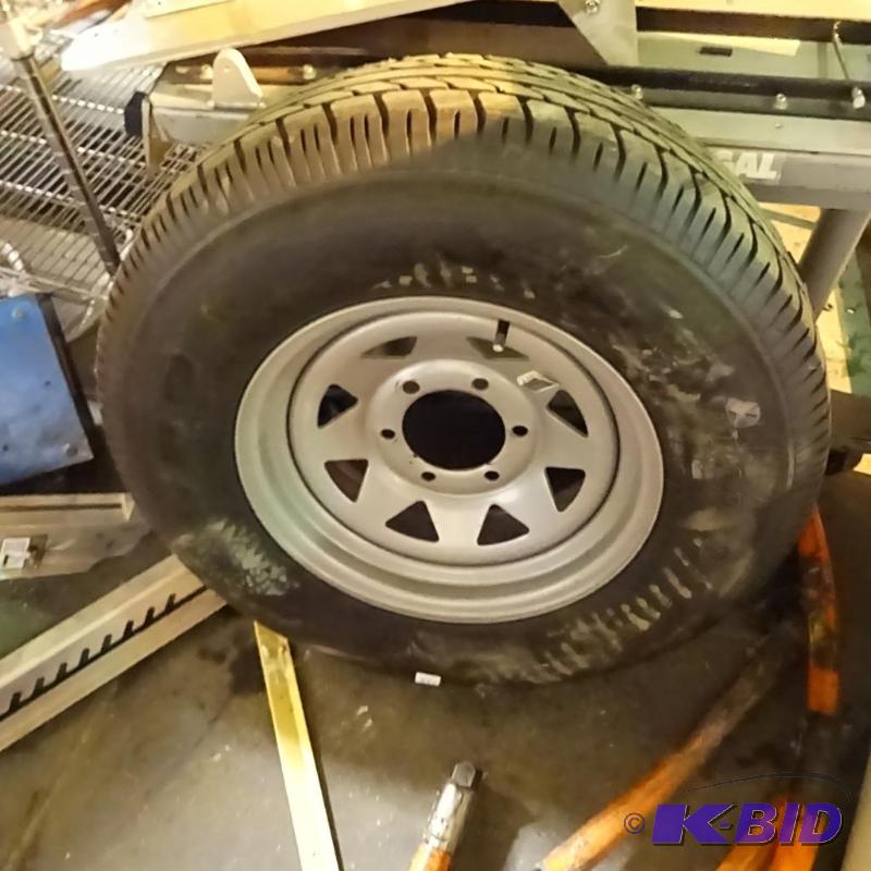 6 hole rim and trailer tire. ST22575R15. New...