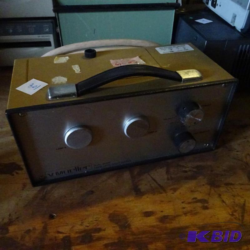 V. Mueller dual beam fiber optic light source...