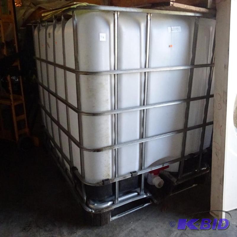 275 gal poly tank. In cage for forklift movin...