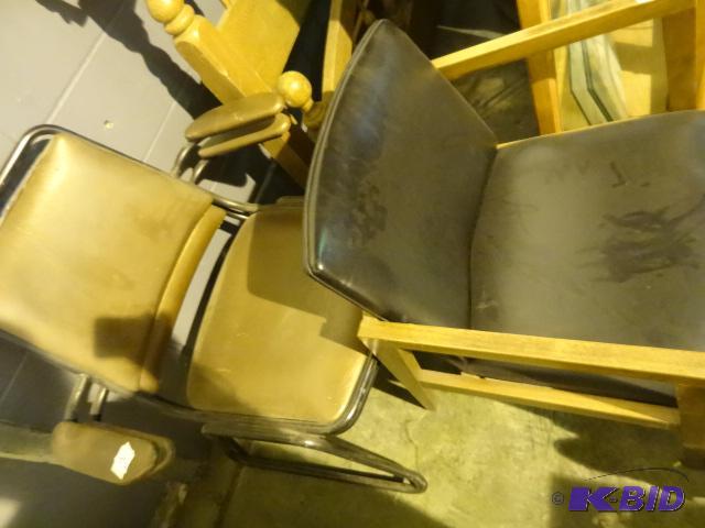 2 brown chairs. 1 black chair...