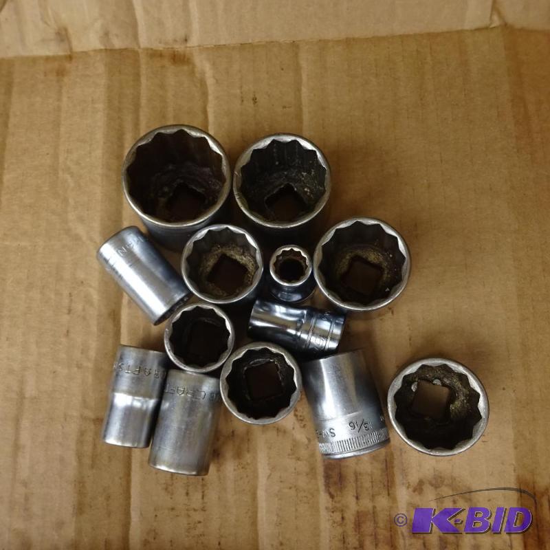 lot 130 image: 12 Craftsman and Snap On Sockets...