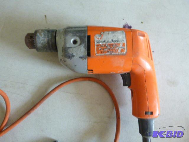 lot 111 image: Black & Decker 12" Variable Speed D...