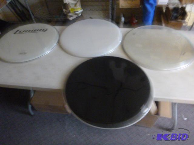 lot 21 image: 4 Drum Skins Approximately 22 34"...