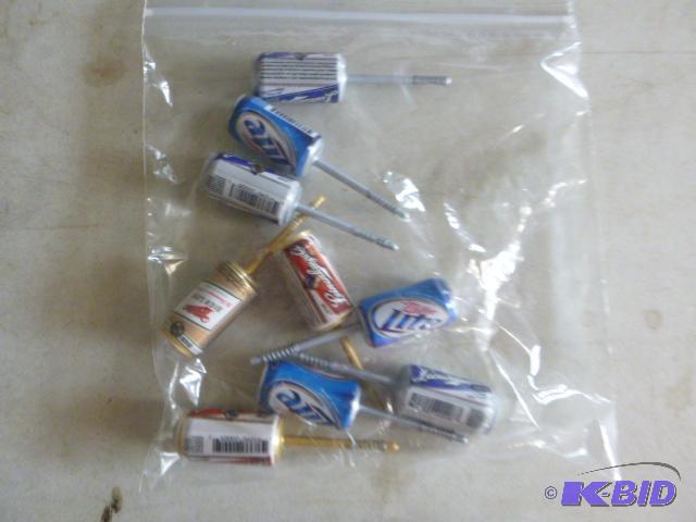 lot 55 image: 9 Beer Can Bobbers...
