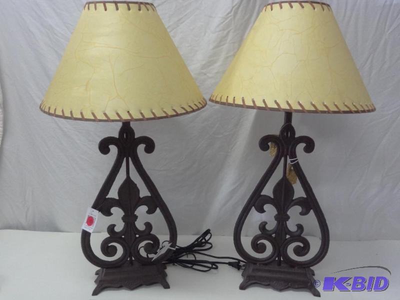 Pair of cast iron lamps, 29 inches high, Fleu...