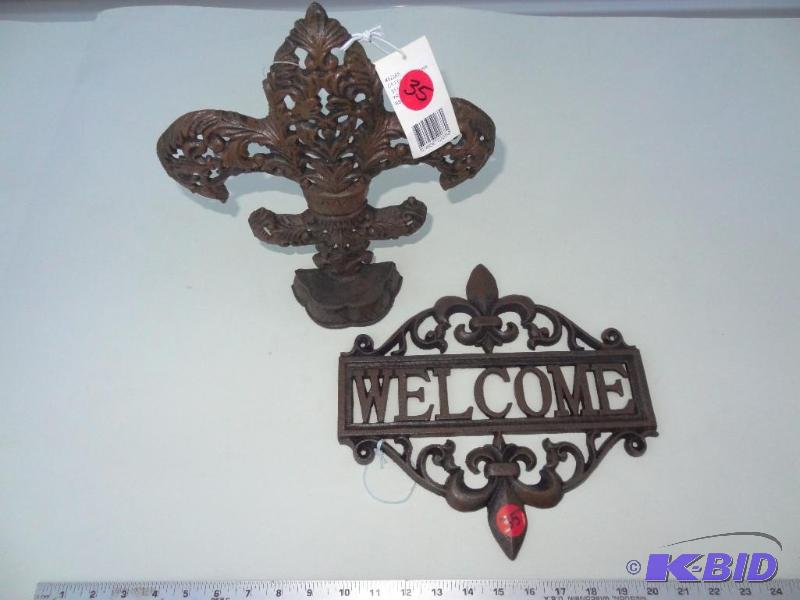 Cast iron standing fleur de lis and cast iron...