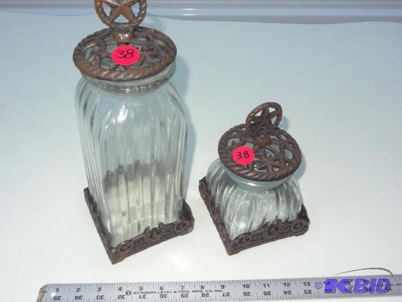 Two piece canister set with cast iron tops an...