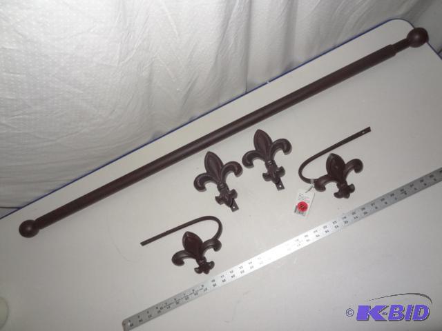 Cast fleur de lis curtain rod and tie back se...