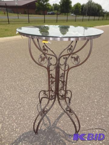 Cast iron and metal horse bistro table with g...