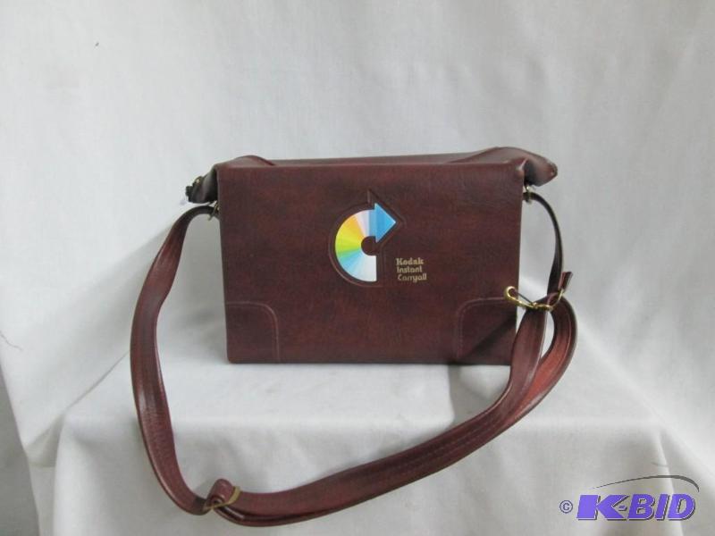 lot 32 image: 2 Kodak Polaroid Cameras and Carrying Case