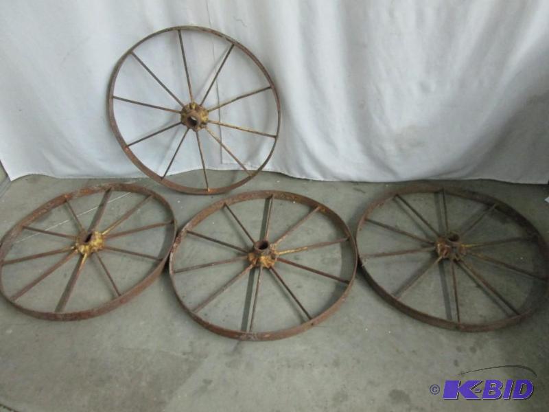 lot 35 image: Four 26 Antique Steel Wheels