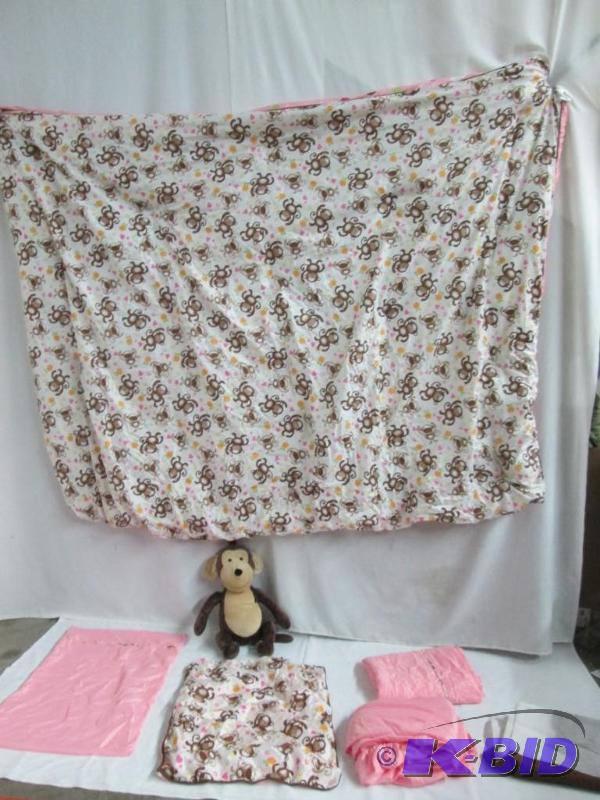 lot 37 image: Monkey Reversible Twin Bed Set w Bonus Zoomate