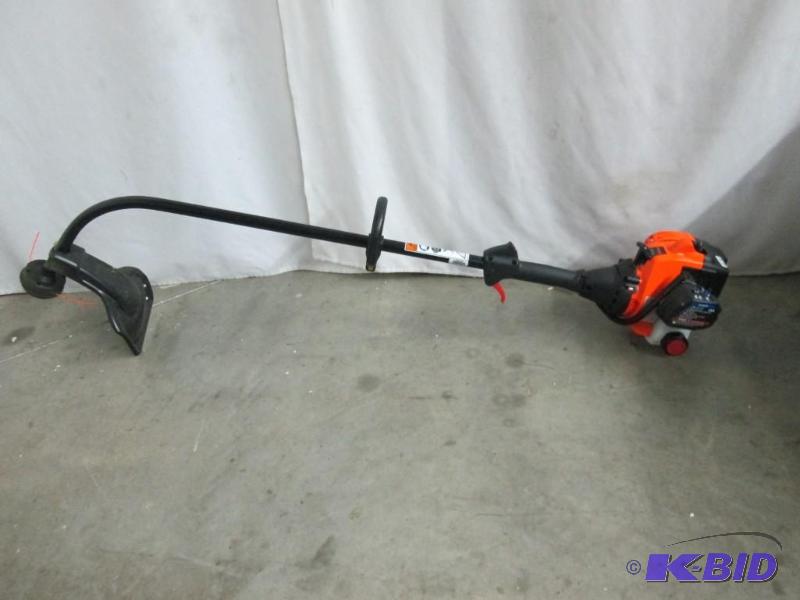 lot 9 image: Remington 17 Curved Shaft Gas Trimmer