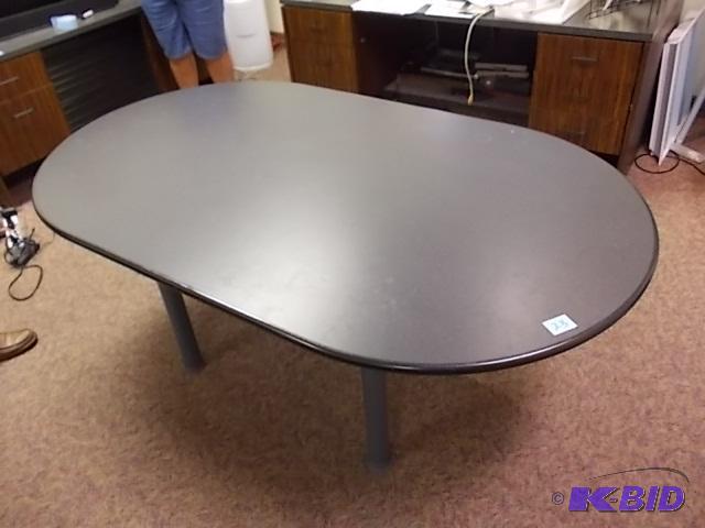 lot 23 image: Black Oval Table 6 ft x 42 in...