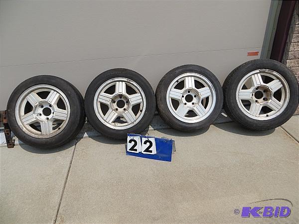 lot 22 image: Set of 4 Aluminum rims &nbspand tires for 80...