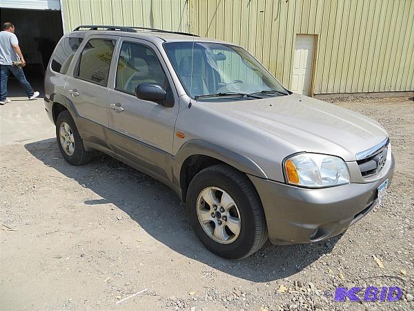 lot 4 image: Year 2002 Make Mazda Model Tribute Mileage...
