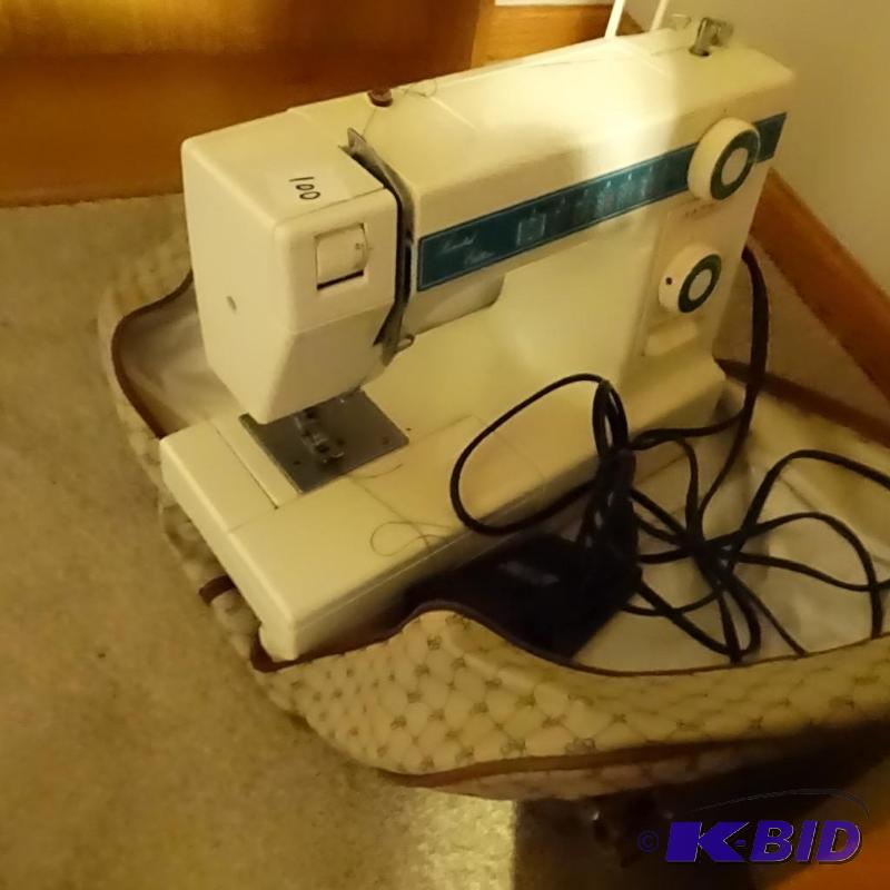 lot 100 image: Janome New home Sewing machine. Limited editi...