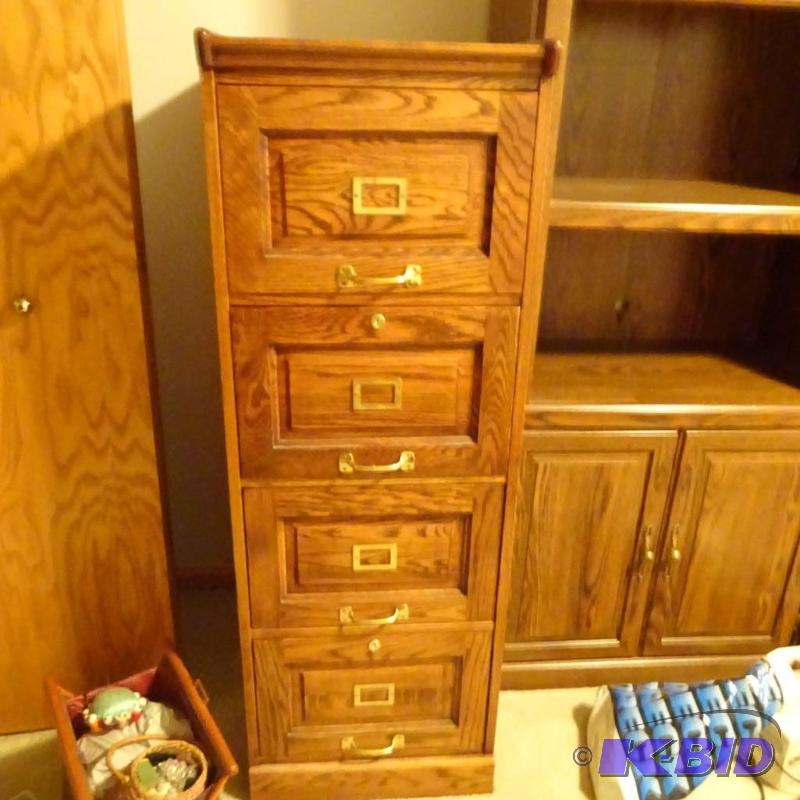 lot 101 image: 4 drawer wood filing cabinet. 19x28x53. Winne...