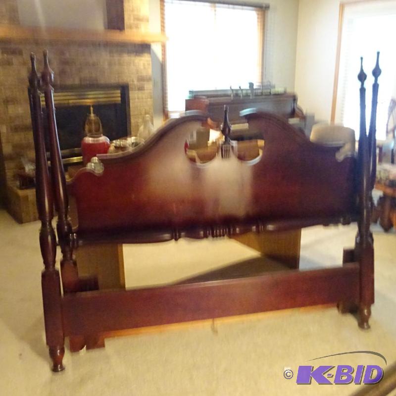 lot 113 image: wood headboard and foot board with metal rail...