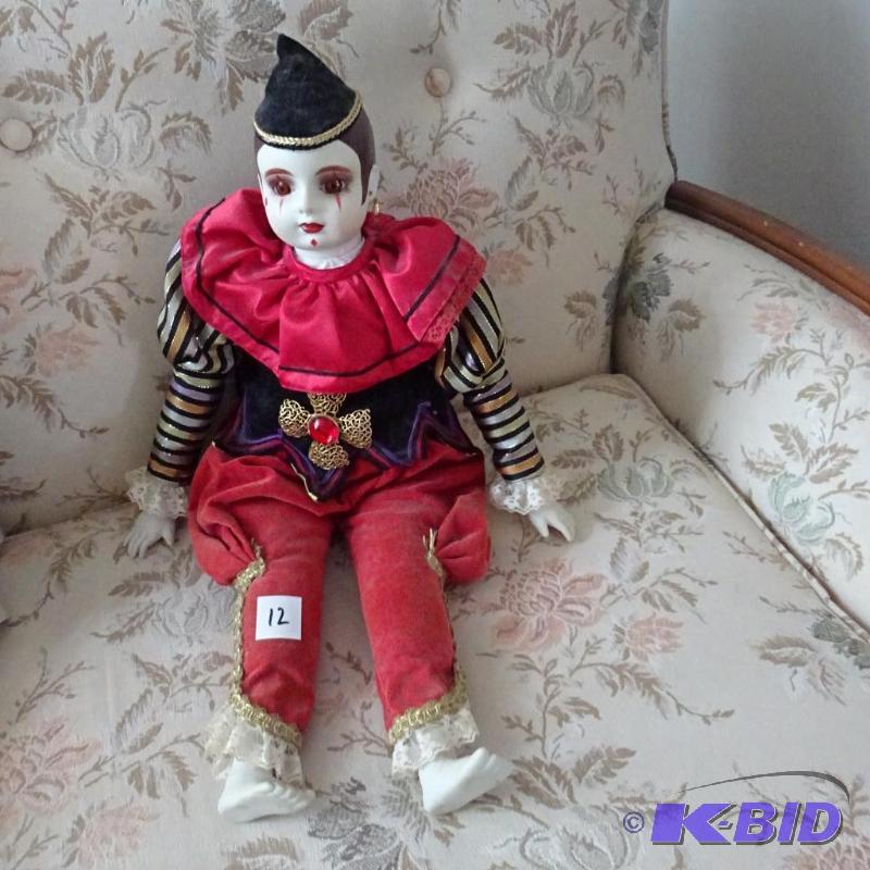 lot 12 image: clown doll music box...