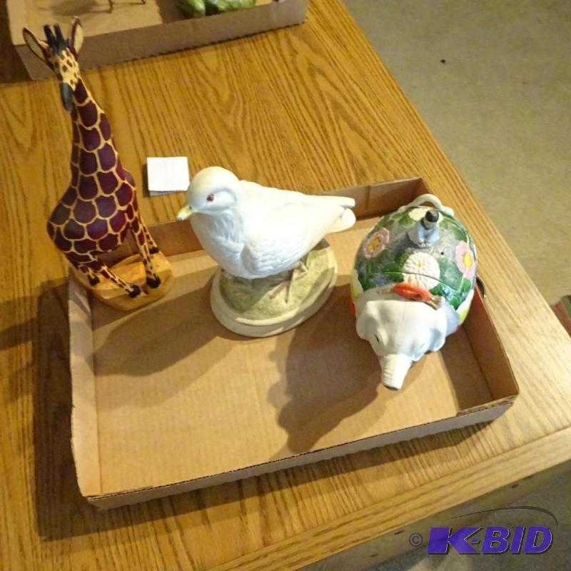 lot 128 image: ceramic pigeon and elephant. Wood giraffe....