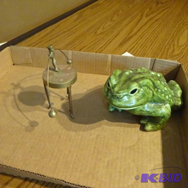 lot 131 image: ceramic frog. Balancing man on table. Ceramic...