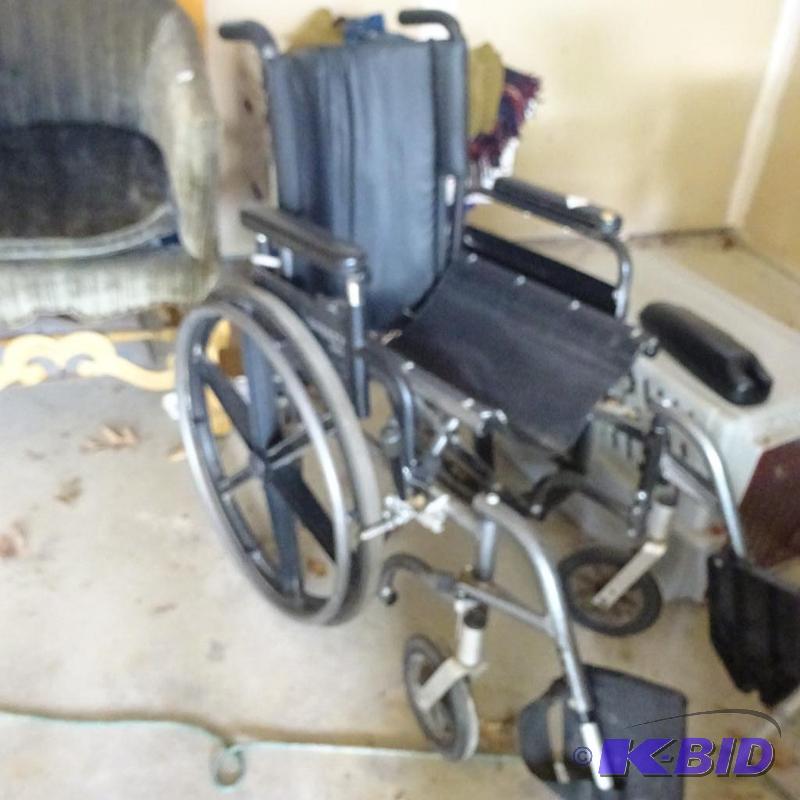 lot 136 image: fold up wheel chair...