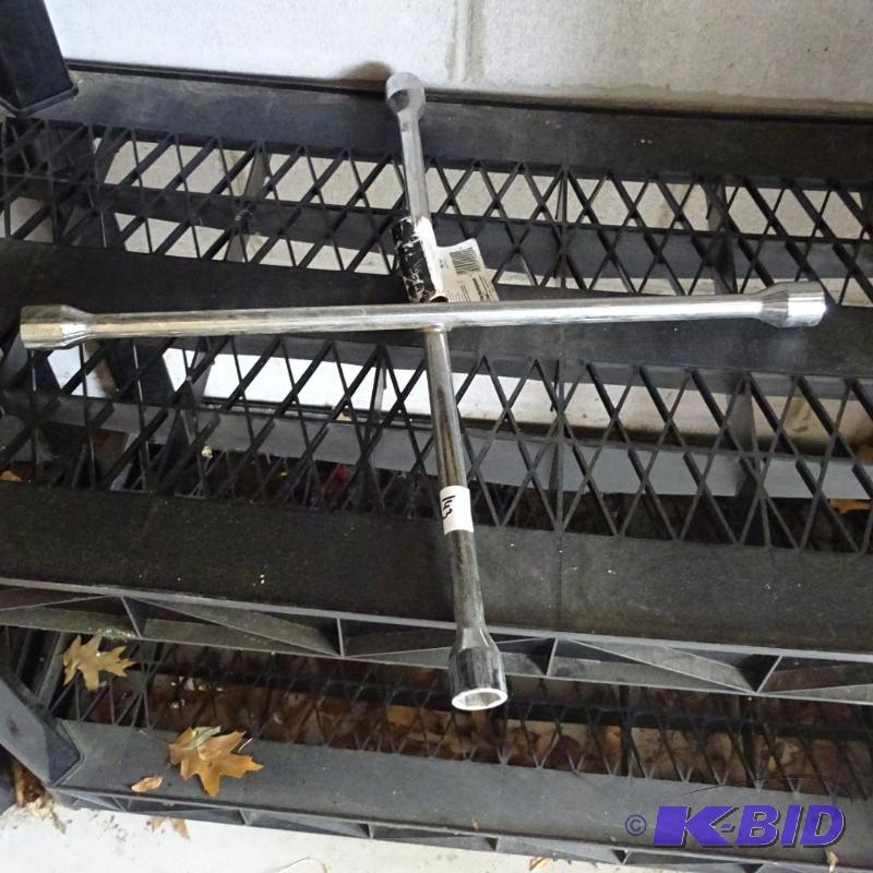 lot 143 image: 4 way tire wrench...