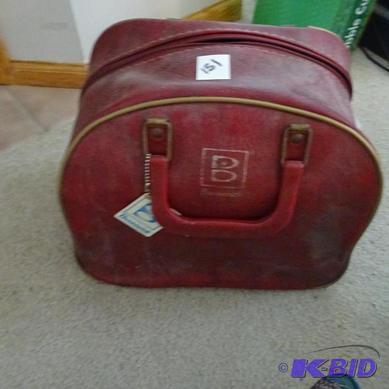 lot 151 image: Brunswick bowling bowl in carrying bag....