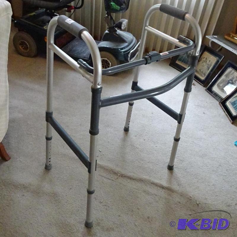 lot 34 image: fold up walker...