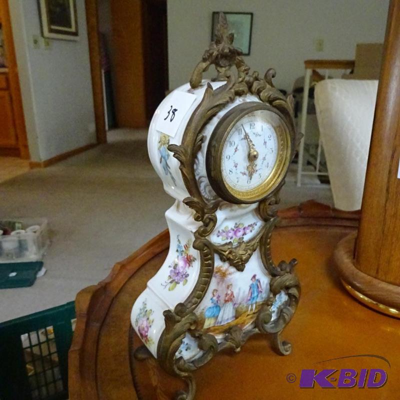 lot 38 image: Vintage wind up clock. Table top. Ceramic and...